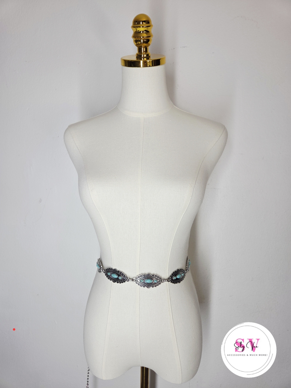 Silver-tone chain belt with turquoise stones.
